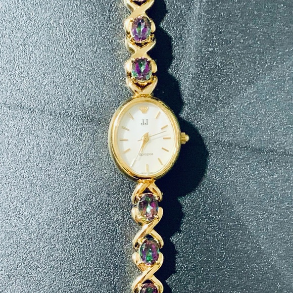Gold Watch with Stainless Steel Back